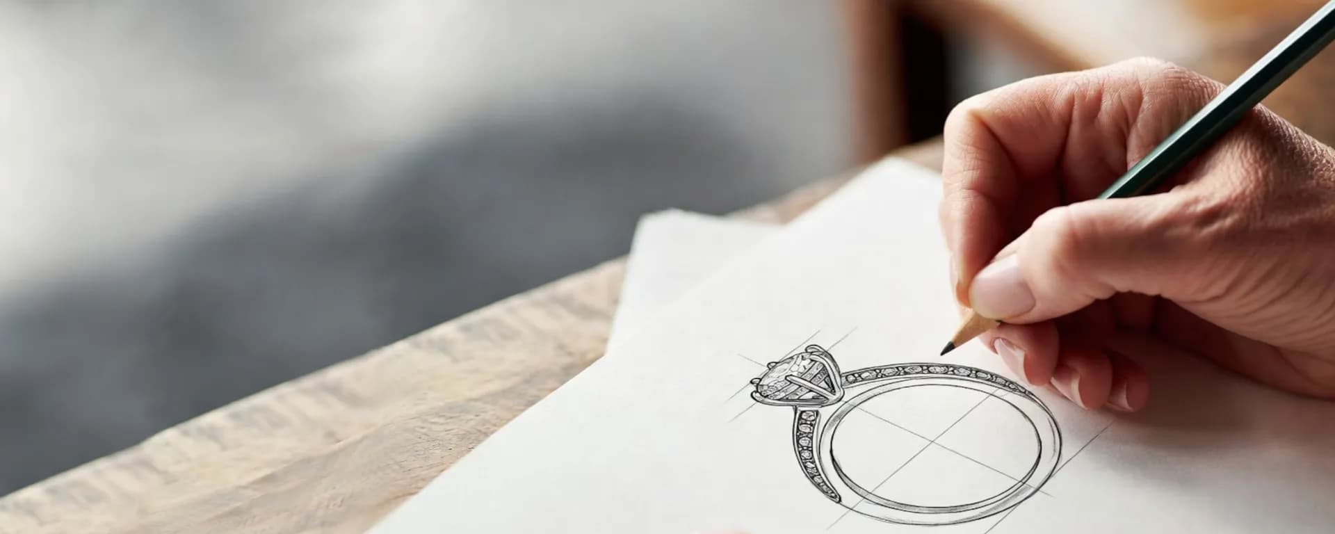 Hand sketching a custom ring design