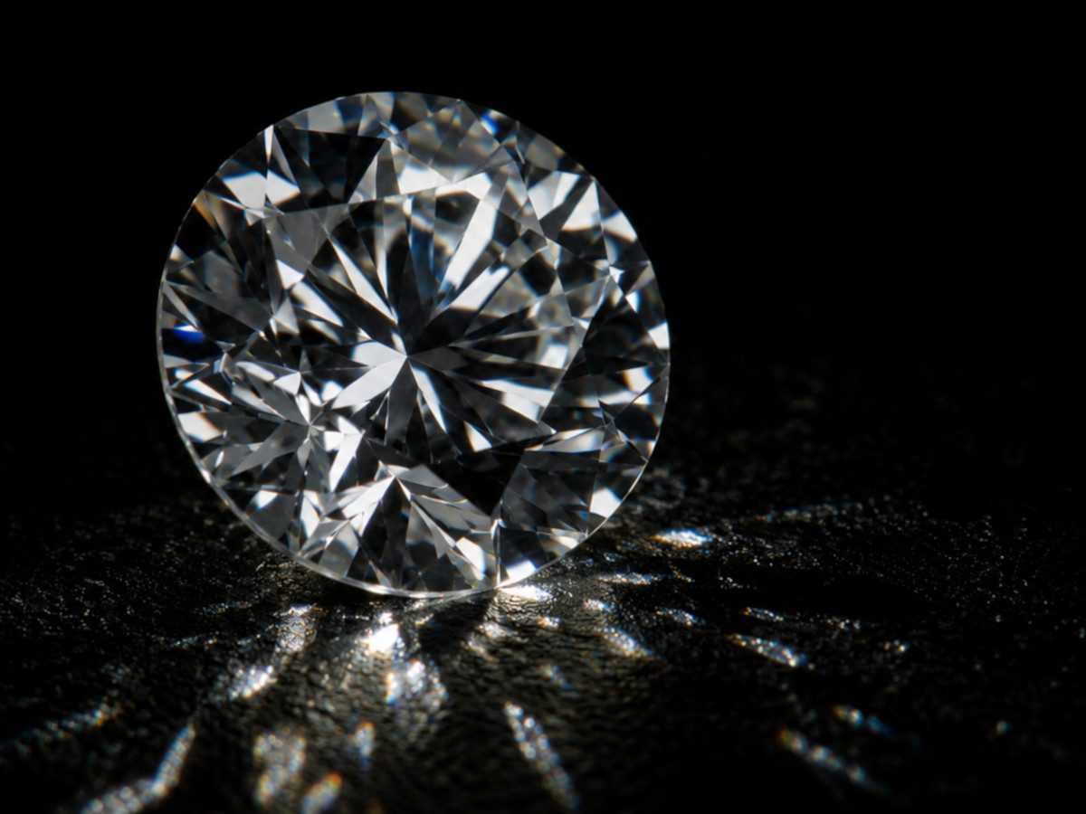Round brilliant diamond on a black background